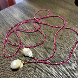 One long string necklace with fresh water pearl